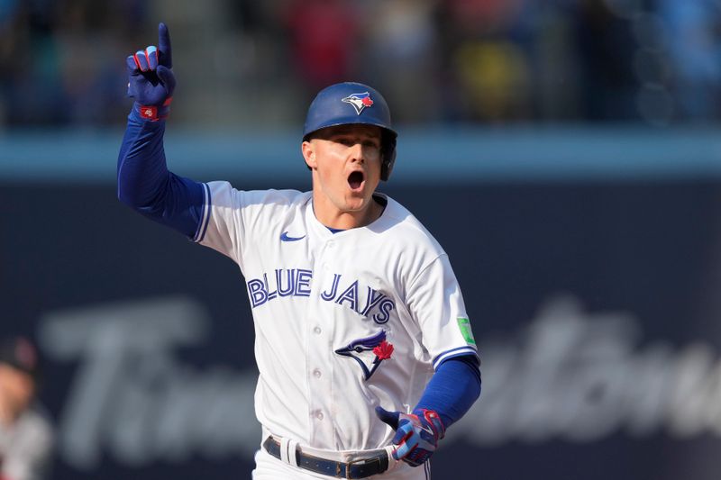 Sep 17, 2023; Toronto, Ontario, CAN; Toronto Blue Jays third baseman Matt Chapman (26) celebrates as he runs the bases after hitting the game winning RBI double against the Boston Red Sox during the ninth inning at Rogers Centre. Mandatory Credit: John E. Sokolowski-USA TODAY Sports