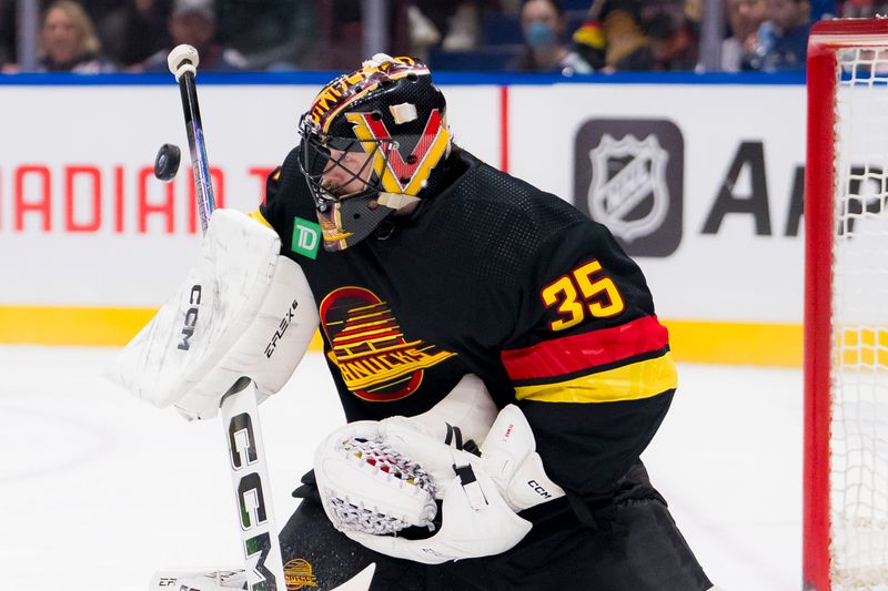 Jan 27, 2024; Vancouver, British Columbia, CAN; Vancouver Canucks goalie Thatcher Demko (35) makes a save against the Columbus Blue Jackets in the third period at Rogers Arena. Canucks won 5-4 in overtime. Mandatory Credit: Bob Frid-USA TODAY Sports