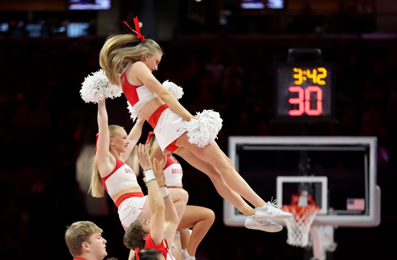 Dec 23, 2025; Columbus, Ohio, USA; Ohio State Buckeyes cheerleaders during the first half against the Grambling State Tigers at Value City Arena. Mandatory Credit: Joseph Maiorana-Imagn Images