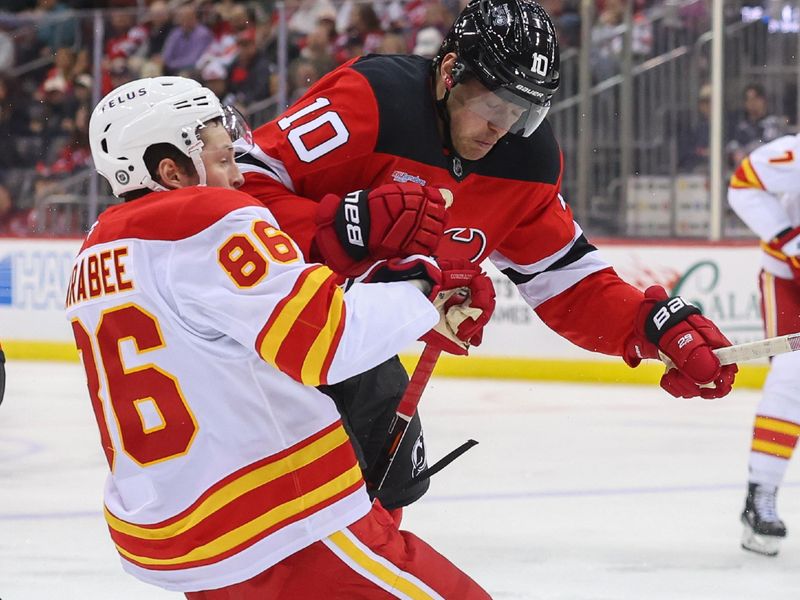 Mar 20, 2025; Newark, New Jersey, USA; New Jersey Devils right wing Daniel Sprong (10) hits Calgary Flames left wing Joel Farabee (86) during the third period at Prudential Center. Mandatory Credit: Ed Mulholland-Imagn Images