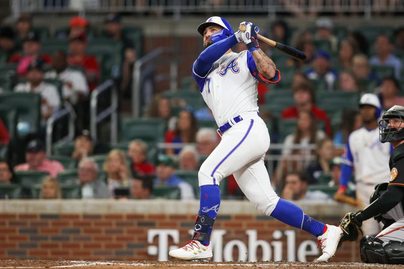 May 6, 2023; Atlanta, Georgia, USA; Atlanta Braves left fielder Kevin Pillar (17) hits a two run home run against the Baltimore Orioles in the eighth inning at Truist Park. Mandatory Credit: Brett Davis-USA TODAY Sports
