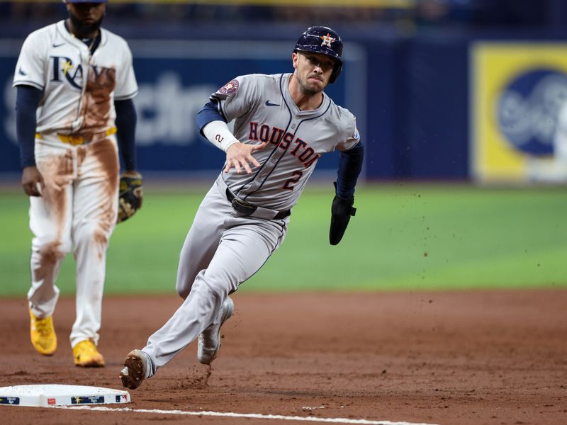 Aug 13, 2024; St. Petersburg, Florida, USA; Houston Astros third baseman Alex Bregman (2) rounds third base to score a run against the Tampa Bay Rays in the third inning at Tropicana Field. Mandatory Credit: Nathan Ray Seebeck-USA TODAY Sports