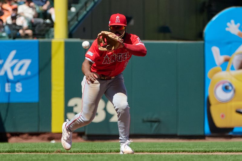 Jun 15, 2024; San Francisco, California, USA; Los Angeles Angels infielder Luis Rengifo (2) fields a ground ball against the San Francisco Giants during the seventh inning at Oracle Park. Mandatory Credit: Robert Edwards-USA TODAY Sports