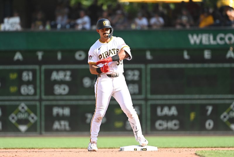 Jul 6, 2024; Pittsburgh, Pennsylvania, USA;  Pittsburgh Pirates base runner Nick Gonzales reacts after hitting a ground rule double during the fgourth inning against the New York Mets at PNC Park. Mandatory Credit: Philip G. Pavely-USA TODAY Sports