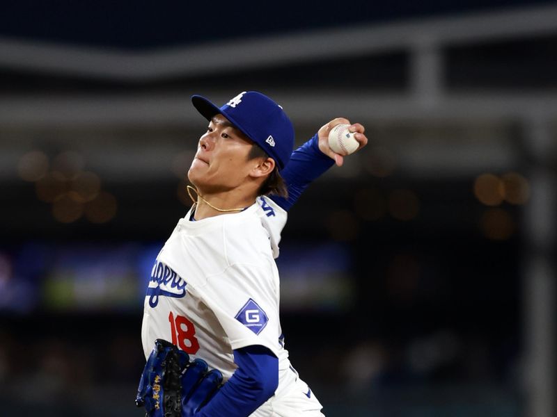 Apr 19, 2024; Los Angeles, California, USA;  Los Angeles Dodgers pitcher Yoshinobu Yamamoto (18) pitches during the fourth inning against the New York Mets at Dodger Stadium. Mandatory Credit: Kiyoshi Mio-USA TODAY Sports