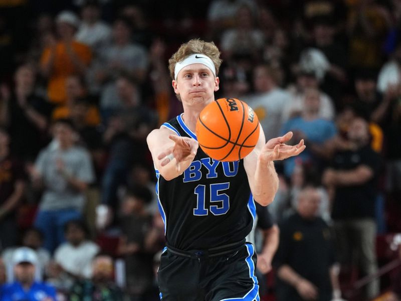 Feb 26, 2025; Tempe, Arizona, USA; Brigham Young Cougars forward Richie Saunders (15) passes against the Arizona State Sun Devils at Desert Financial Arena. Mandatory Credit: Joe Camporeale-Imagn Images