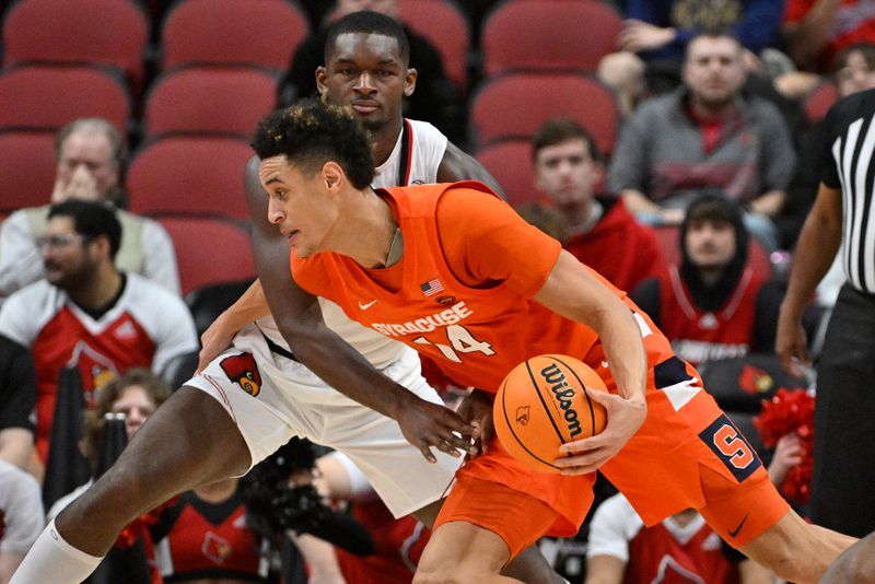 Jan 3, 2023; Louisville, Kentucky, USA; Syracuse Orange center Jesse Edwards (14) dribbles against Louisville Cardinals forward Brandon Huntley-Hatfield (5) during the second half at KFC Yum! Center. Mandatory Credit: Jamie Rhodes-USA TODAY Sports