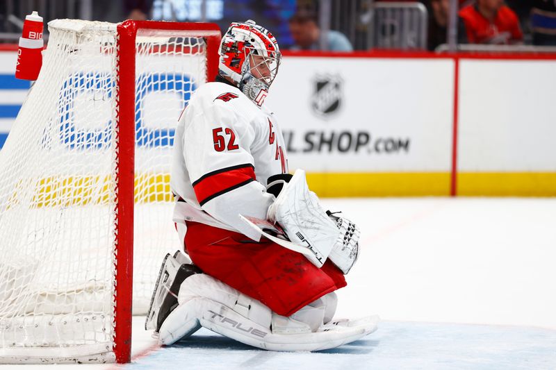 Mar 22, 2024; Washington, District of Columbia, USA; Carolina Hurricanes goaltender Pyotr Kochetkov (52) reacts after allowing a goal against the Washington Capitals during the third period at Capital One Arena. Mandatory Credit: Amber Searls-USA TODAY Sports