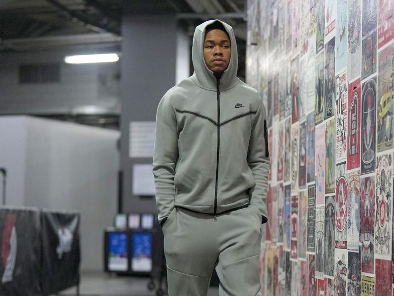 PORTLAND, OREGON - FEBRUARY 27: Anfernee Simons #1 of the Portland Trail Blazers arrives to the arena prior to the game against the Miami Heat at Moda Center on February 27, 2024 in Portland, Oregon. NOTE TO USER: User expressly acknowledges and agrees that, by downloading and or using this photograph, User is consenting to the terms and conditions of the Getty Images License Agreement. (Photo by Soobum Im/Getty Images)