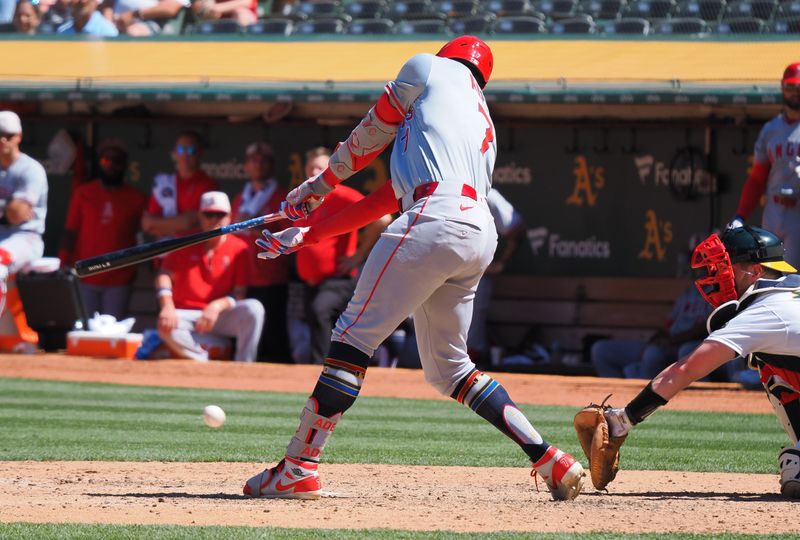 Jul 4, 2024; Oakland, California, USA; Los Angeles Angels right fielder Jo Adell (7) strikes out against the Oakland Athletics during the ninth inning at Oakland-Alameda County Coliseum. Mandatory Credit: Kelley L Cox-USA TODAY Sports