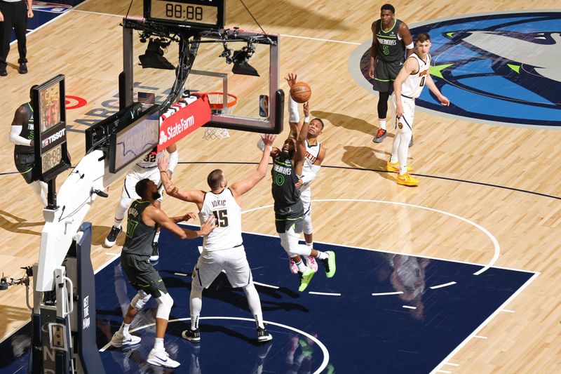 MINNEAPOLIS, MN -  NOVEMBER 1: Russell Westbrook #4 of the Denver Nuggets block during the game against the Minnesota Timberwolves on November 1, 2024 at Target Center in Minneapolis, Minnesota. NOTE TO USER: User expressly acknowledges and agrees that, by downloading and or using this Photograph, user is consenting to the terms and conditions of the Getty Images License Agreement. Mandatory Copyright Notice: Copyright 2024 NBAE (Photo by David Sherman/NBAE via Getty Images)