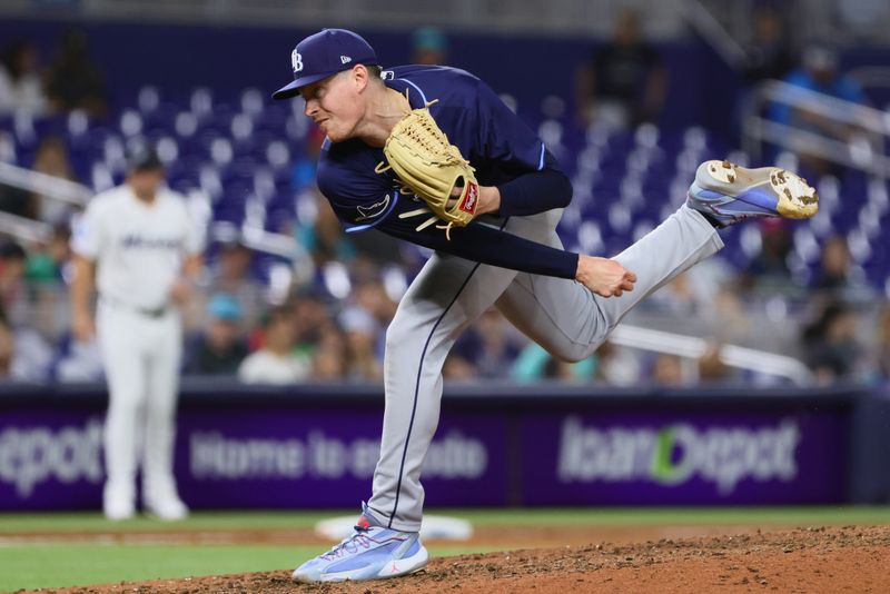 Jun 5, 2024; Miami, Florida, USA; Tampa Bay Rays relief pitcher Pete Fairbanks (29) delivers a pitch against the Miami Marlins during the ninth inning at loanDepot Park. Mandatory Credit: Sam Navarro-USA TODAY Sports