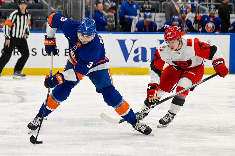 Apr 14, 2026; Elmont, New York, USA; New York Islanders defenseman Adam Pelech (3) attempts to get the puck out of the zone defended by Carolina Hurricanes left wing Bradly Nadeau (29) during the third period at UBS Arena. Mandatory Credit: Dennis Schneidler-Imagn Images Apr 14, 2026; Elmont, New York, USA; New York Islanders defenseman Adam Pelech (3) attempts to get the puck out of the zone defended by Carolina Hurricanes left wing Bradly Nadeau (29) during the third period at UBS Arena. Mandatory Credit: Dennis Schneidler-Imagn Images