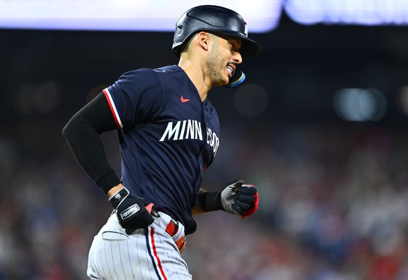 Aug 12, 2023; Philadelphia, Pennsylvania, USA; Minnesota Twins shortstop Carlos Correa (4) rounds the bases after hitting a home run against the Philadelphia Phillies in the seventh inning at Citizens Bank Park. Mandatory Credit: Kyle Ross-USA TODAY Sports