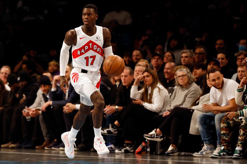 NEW YORK, NEW YORK - NOVEMBER 28: Dennis Schroder #17 of the Toronto Raptors dribbles during the first half of an NBA In-Season Tournament game against the Brooklyn Nets at Barclays Center on November 28, 2023 in the Brooklyn borough of New York City. NOTE TO USER: User expressly acknowledges and agrees that, by downloading and/or using this photograph, User is consenting to the terms and conditions of the Getty Images License Agreement. (Photo by Sarah Stier/Getty Images)