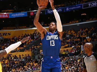 LOS ANGELES, CA - OCTOBER 20: Paul George #13 of the LA Clippers shoots a three point basket during the game against the Los Angeles Lakers on October 20, 2022 at Crypto.com Arena in Los Angeles, California. NOTE TO USER: User expressly acknowledges and agrees that, by downloading and/or using this Photograph, user is consenting to the terms and conditions of the Getty Images License Agreement. Mandatory Copyright Notice: Copyright 2022 NBAE (Photo by Andrew D. Bernstein/NBAE via Getty Images)