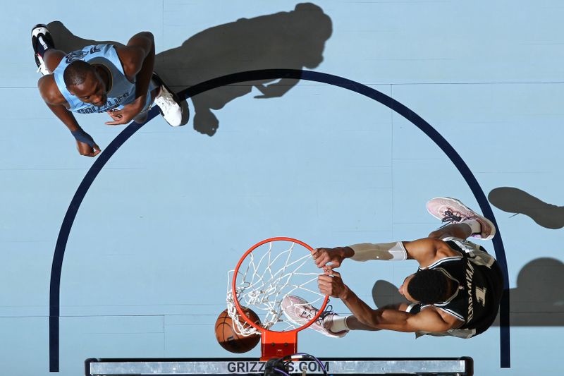 MEMPHIS, TN - JANUARY 2:  Victor Wembanyama #1 of the San Antonio Spurs goes to the basket during the game on January 2, 2024 at FedExForum in Memphis, Tennessee. NOTE TO USER: User expressly acknowledges and agrees that, by downloading and or using this photograph, User is consenting to the terms and conditions of the Getty Images License Agreement. Mandatory Copyright Notice: Copyright 2024 NBAE (Photo by Joe Murphy/NBAE via Getty Images)