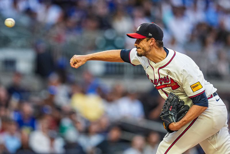 Sep 15, 2024; Cumberland, Georgia, USA; Atlanta Braves starting pitcher Charlie Morton (50) pitches against the Los Angeles Dodgers during the first inning at Truist Park. Mandatory Credit: Dale Zanine-Imagn Images