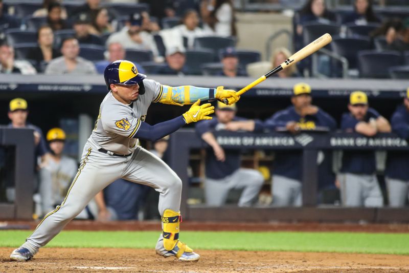 Sep 8, 2023; Bronx, New York, USA;  Milwaukee Brewers catcher William Contreras (24) hits an RBI single in the seventh inning against the New York Yankees at Yankee Stadium. Mandatory Credit: Wendell Cruz-USA TODAY Sports