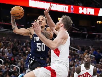 ORLANDO, FLORIDA - NOVEMBER 21: Cole Anthony #50 of the Orlando Magic drives to the basket against the Toronto Raptors during the first half of an NBA In-Season Tournament game at Amway Center on November 21, 2023 in Orlando, Florida. NOTE TO USER: User expressly acknowledges and agrees that, by downloading and or using this photograph, User is consenting to the terms and conditions of the Getty Images License Agreement. (Photo by Rich Storry/Getty Images)