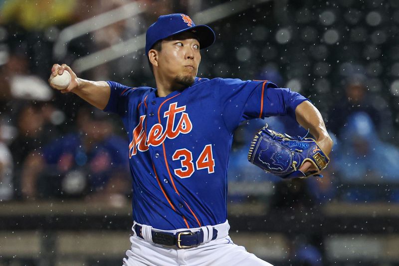 Aug 7, 2023; New York City, New York, USA; New York Mets starting pitcher Kodai Senga (34) delivers a pitch during the sixth inning against the Chicago Cubs at Citi Field. Mandatory Credit: Vincent Carchietta-USA TODAY Sports