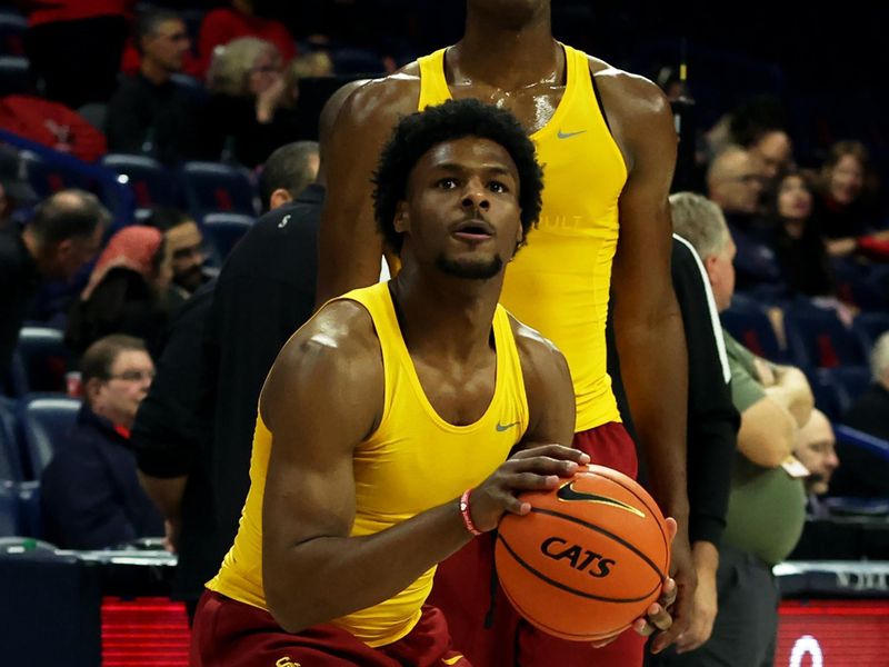 Jan 17, 2024; Tucson, Arizona, USA; USC Trojans guard Bronny James (center) warms up before a game against the Arizona Wildcats at McKale Center. Mandatory Credit: Zachary BonDurant-USA TODAY Sports