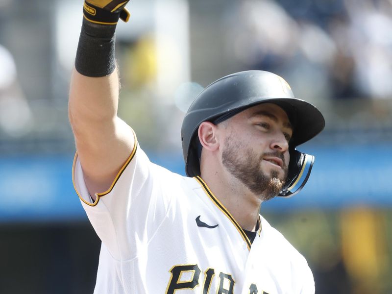 Aug 13, 2023; Pittsburgh, Pennsylvania, USA; Pittsburgh Pirates pinch hitter Jared Triolo (19) circles the bases on a three run home run to record his first major league home run against the Cincinnati Reds during the seventh inning at PNC Park. Mandatory Credit: Charles LeClaire-USA TODAY Sports