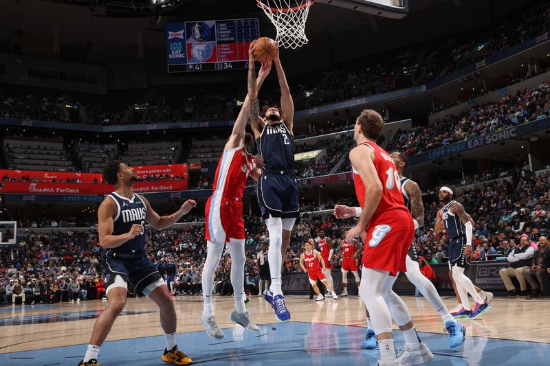 MEMPHIS, TN - JANUARY 6:  Dereck Lively II #2 of the Dallas Mavericks drives to the basket during the game against the Memphis Grizzlies on January  6, 2024 at FedExForum in Memphis, Tennessee. NOTE TO USER: User expressly acknowledges and agrees that, by downloading and or using this photograph, User is consenting to the terms and conditions of the Getty Images License Agreement. Mandatory Copyright Notice: Copyright 2024 NBAE (Photo by Joe Murphy/NBAE via Getty Images)