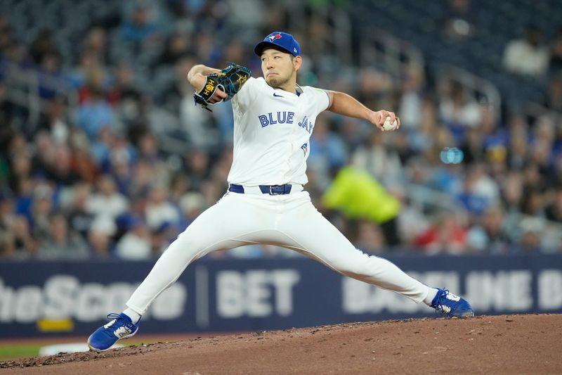 Apr 16, 2024; Toronto, Ontario, CAN; Toronto Blue Jays starting pitcher Yusei Kikuchi (16) pitches to to the New York Yankees during the second inning at Rogers Centre. Mandatory Credit: John E. Sokolowski-USA TODAY Sports