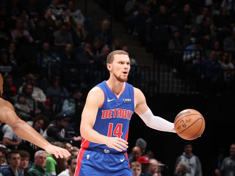 MINNEAPOLIS, MN -  MARCH 27:  Malachi Flynn #14 of the Detroit Pistons handles the ball during the game against the Minnesota Timberwolves on March 27, 2024 at Target Center in Minneapolis, Minnesota. NOTE TO USER: User expressly acknowledges and agrees that, by downloading and or using this Photograph, user is consenting to the terms and conditions of the Getty Images License Agreement. Mandatory Copyright Notice: Copyright 2024 NBAE (Photo by David Sherman/NBAE via Getty Images)