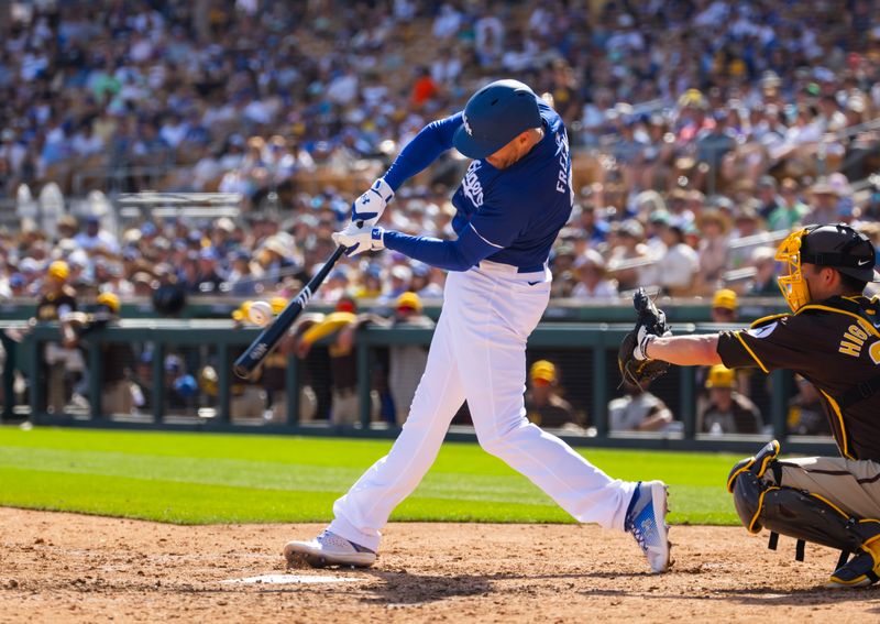 Feb 23, 2024; Phoenix, Arizona, USA; Los Angeles Dodgers first baseman Freddie Freeman against the San Diego Padres during a spring training game at Camelback Ranch-Glendale. Mandatory Credit: Mark J. Rebilas-USA TODAY Sports