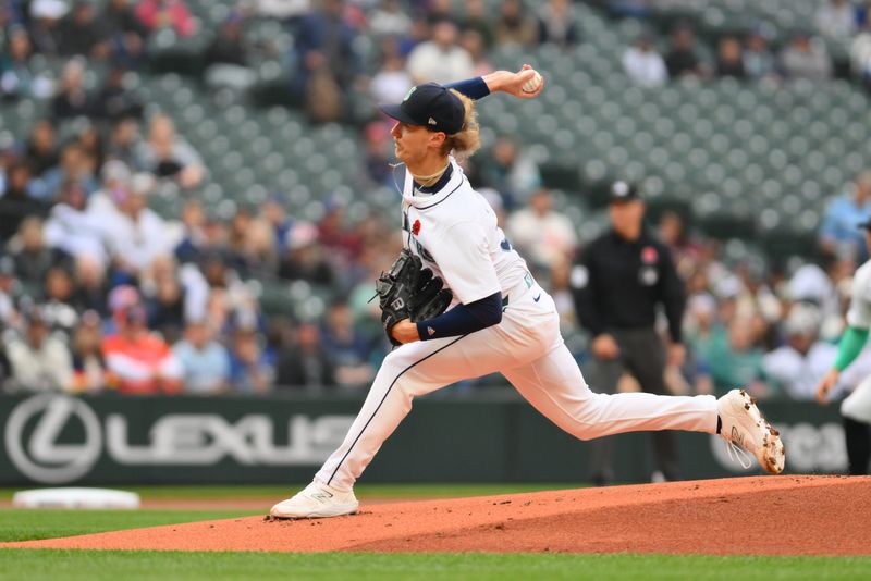 May 27, 2024; Seattle, Washington, USA; Seattle Mariners starting pitcher Bryce Miller (50) pitches to the Houston Astros during the first inning at T-Mobile Park. Mandatory Credit: Steven Bisig-USA TODAY Sports