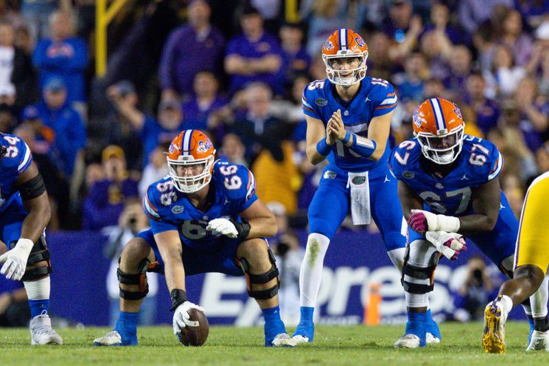 Nov 11, 2023; Baton Rouge, Louisiana, USA;  Florida Gators quarterback Graham Mertz (15) calls form the ball against the LSU Tigers during the first half at Tiger Stadium. Mandatory Credit: Stephen Lew-USA TODAY Sports