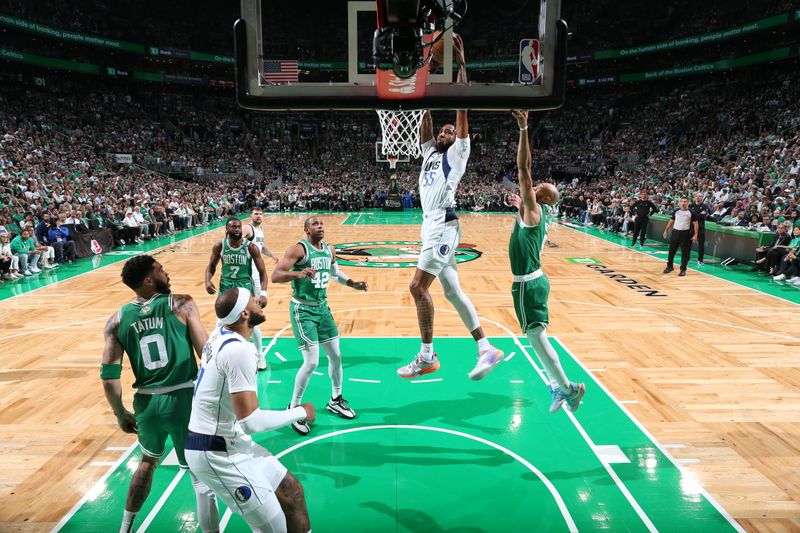 BOSTON, MA - JUNE 17: Derrick Jones Jr. #55 of the Dallas Mavericks dunks the ball during the game against the Boston Celtics during Game 5 of the 2024 NBA Finals on June 17, 2024 at the TD Garden in Boston, Massachusetts. NOTE TO USER: User expressly acknowledges and agrees that, by downloading and or using this photograph, User is consenting to the terms and conditions of the Getty Images License Agreement. Mandatory Copyright Notice: Copyright 2024 NBAE  (Photo by Nathaniel S. Butler/NBAE via Getty Images)