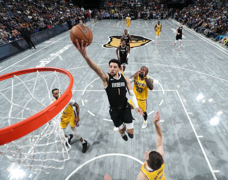 MEMPHIS, TN - APRIL 12: Scotty Pippen Jr. #1 of the Memphis Grizzlies drives to the basket during the game against the Los Angeles Lakers on April 12, 2024 at FedExForum in Memphis, Tennessee. NOTE TO USER: User expressly acknowledges and agrees that, by downloading and or using this photograph, User is consenting to the terms and conditions of the Getty Images License Agreement. Mandatory Copyright Notice: Copyright 2024 NBAE (Photo by Joe Murphy/NBAE via Getty Images)