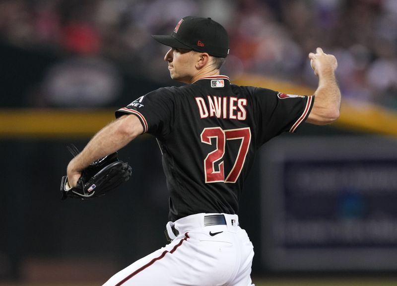 Aug 26, 2023; Phoenix, Arizona, USA; Arizona Diamondbacks starting pitcher Zach Davies (27) pitches against the Cincinnati Reds during the first inning at Chase Field. Mandatory Credit: Joe Camporeale-USA TODAY Sports