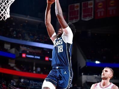 HOUSTON, TX - DECEMBER 22:   Olivier Maxence-Prosper #18 of the Dallas Mavericks drives to the basket during the game against the Houston Rockets on December 22, 2023 at the Toyota Center in Houston, Texas. NOTE TO USER: User expressly acknowledges and agrees that, by downloading and or using this photograph, User is consenting to the terms and conditions of the Getty Images License Agreement. Mandatory Copyright Notice: Copyright 2023 NBAE (Photo by Logan Riely/NBAE via Getty Images)