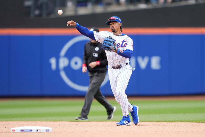 Jun 1, 2025; New York City, New York, USA; New York Mets shortstop Francisco Lindor (12) throws out Colorado Rockies second baseman Orlando Arcia (8) (not pictured) after fielding a ground ball during the eighth inning at Citi Field. Mandatory Credit: Gregory Fisher-Imagn Images