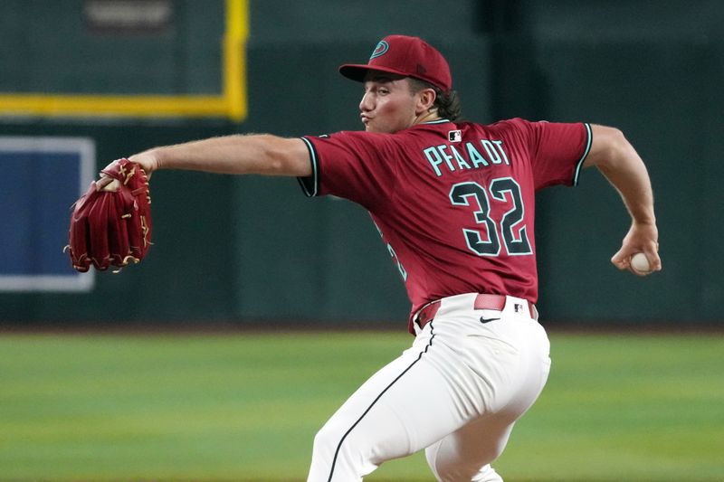 Aug 20, 2025; Phoenix, Arizona, USA; Arizona Diamondbacks pitcher Brandon Pfaadt (32) throws against the Cleveland Guardians in the first inning at Chase Field. Mandatory Credit: Rick Scuteri-Imagn Images