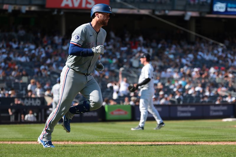 Aug 11, 2024; Bronx, New York, USA; Texas Rangers catcher Carson Kelly (18) rounds the bases after hitting a two run home run during the eighth inning against New York Yankees relief pitcher Mark Leiter Jr. (38) at Yankee Stadium. Mandatory Credit: Vincent Carchietta-USA TODAY Sports