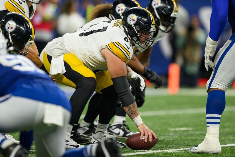 Pittsburgh Steelers offensive lineman Mason Cole (61) prepares to snap the football during an NFL football game against the Indianapolis Colts, Saturday, Dec. 16, 2023, in Indianapolis. (AP Photo/Zach Bolinger)