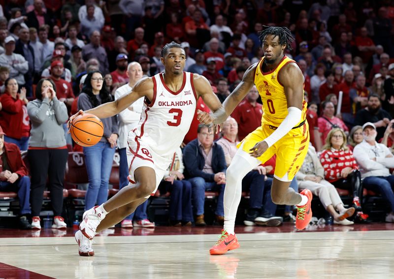 Jan 6, 2024; Norman, Oklahoma, USA; Oklahoma Sooners guard Otega Oweh (3) moves around Iowa State Cyclones forward Tre King (0) during the second half at Lloyd Noble Center. Mandatory Credit: Alonzo Adams-USA TODAY Sports