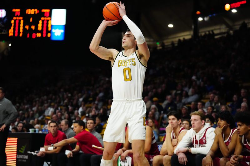 Feb 5, 2023; Boulder, Colorado, USA; Colorado Buffaloes guard Luke O'Brien (0) lines up a shot on the net in the first half against the Stanford Cardinal at the CU Events Center. Mandatory Credit: Ron Chenoy-USA TODAY Sports