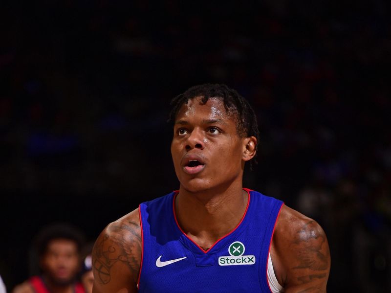 DETROIT, MI - MARCH 23: Marcus Sasser #25 of the Detroit Pistons shoots a free throw during the game against the New Orleans Pelicans on March 23, 2025 at Little Caesars Arena in Detroit, Michigan. NOTE TO USER: User expressly acknowledges and agrees that, by downloading and/or using this photograph, User is consenting to the terms and conditions of the Getty Images License Agreement. Mandatory Copyright Notice: Copyright 2025 NBAE (Photo by Chris Schwegler/NBAE via Getty Images)