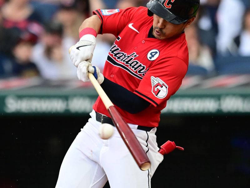 Jun 2, 2024; Cleveland, Ohio, USA; Cleveland Guardians left fielder Steven Kwan (38) hits a single during the fifth inning against the Washington Nationals at Progressive Field. Mandatory Credit: Ken Blaze-USA TODAY Sports
