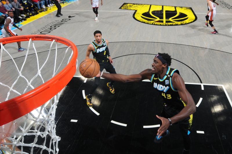 INDIANAPOLIS, IN - APRIL 7: Pascal Siakam #43 of the Indiana Pacers grabs the rebound during the game against the Miami Heat on April 7, 2024 at Gainbridge Fieldhouse in Indianapolis, Indiana. NOTE TO USER: User expressly acknowledges and agrees that, by downloading and or using this Photograph, user is consenting to the terms and conditions of the Getty Images License Agreement. Mandatory Copyright Notice: Copyright 2024 NBAE (Photo by Ron Hoskins/NBAE via Getty Images)