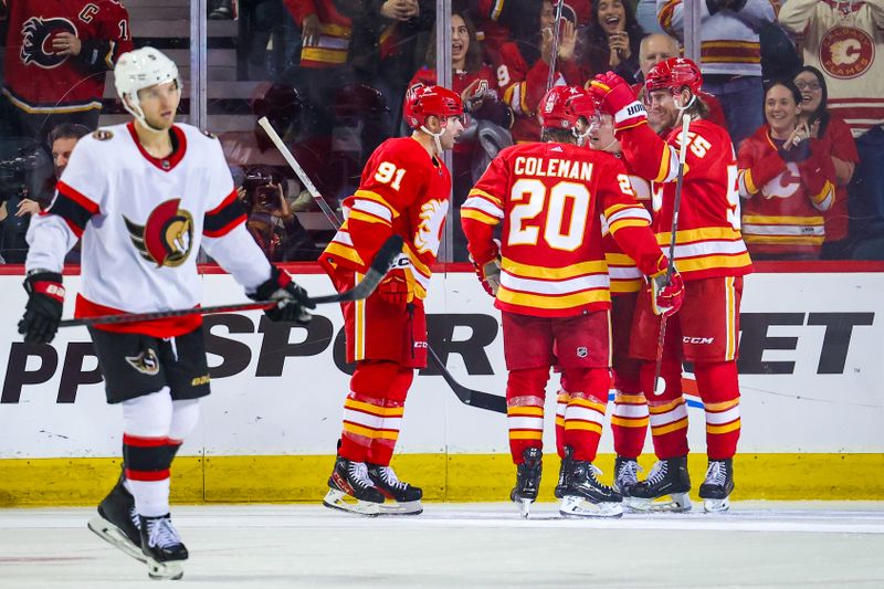 Jan 9, 2024; Calgary, Alberta, CAN; Calgary Flames center Blake Coleman (20) celebrates his goal with teammates against the Ottawa Senators during the third period at Scotiabank Saddledome. Mandatory Credit: Sergei Belski-USA TODAY Sports