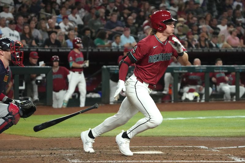 Jul 11, 2024; Phoenix, Arizona, USA; Arizona Diamondbacks outfielder Jake McCarthy (31) hits against the Atlanta Braves in the fourth inning at Chase Field. Mandatory Credit: Rick Scuteri-USA TODAY Sports