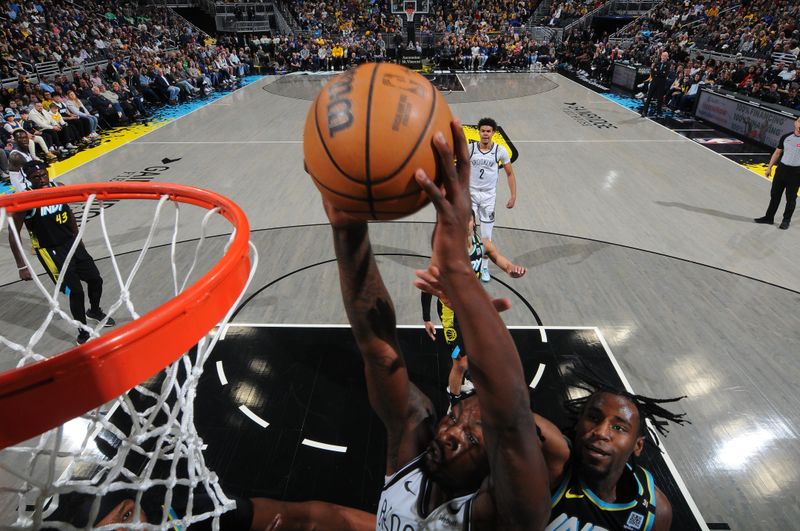 INDIANAPOLIS, IN - MARCH 16: Dorian Finney-Smith #28 of the Brooklyn Nets dunks the ball during the game against the Indiana Pacers on March 16, 2024 at Gainbridge Fieldhouse in Indianapolis, Indiana. NOTE TO USER: User expressly acknowledges and agrees that, by downloading and or using this Photograph, user is consenting to the terms and conditions of the Getty Images License Agreement. Mandatory Copyright Notice: Copyright 2024 NBAE (Photo by Ron Hoskins/NBAE via Getty Images)