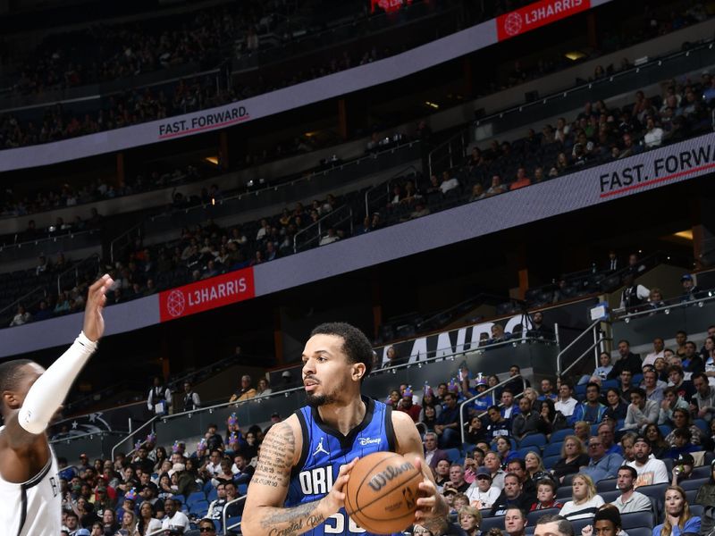 ORLANDO, FL - FEBRUARY 27: Cole Anthony #50 of the Orlando Magic handles the ball during the game against the Brooklyn Nets on February 27, 2024 at the Kia Center in Orlando, Florida. NOTE TO USER: User expressly acknowledges and agrees that, by downloading and or using this photograph, User is consenting to the terms and conditions of the Getty Images License Agreement. Mandatory Copyright Notice: Copyright 2024 NBAE (Photo by Fernando Medina/NBAE via Getty Images)